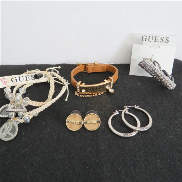 GUESS Jewellery lot.  Includes 4 bracelets, 2 rings, and 2 pairs of earrings.