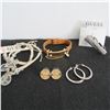 Image 1 : GUESS Jewellery lot.  Includes 4 bracelets, 2 rings, and 2 pairs of earrings.