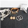 Image 2 : GUESS Jewellery lot.  Includes 4 bracelets, 2 rings, and 2 pairs of earrings.