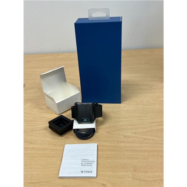 Fitbit with box and charger - not tested, see photos