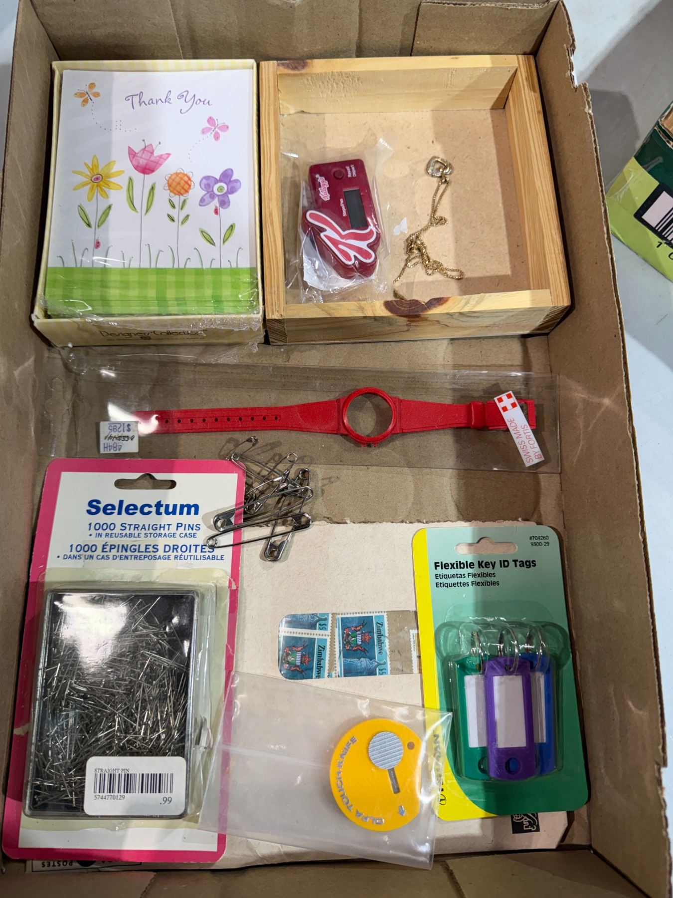 Key tags, straight pins thank you cards and other items
