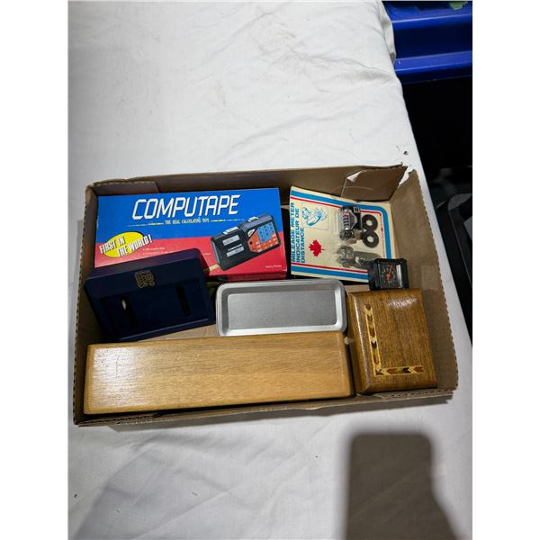 Calculating tape, mileage meter and assorted items
