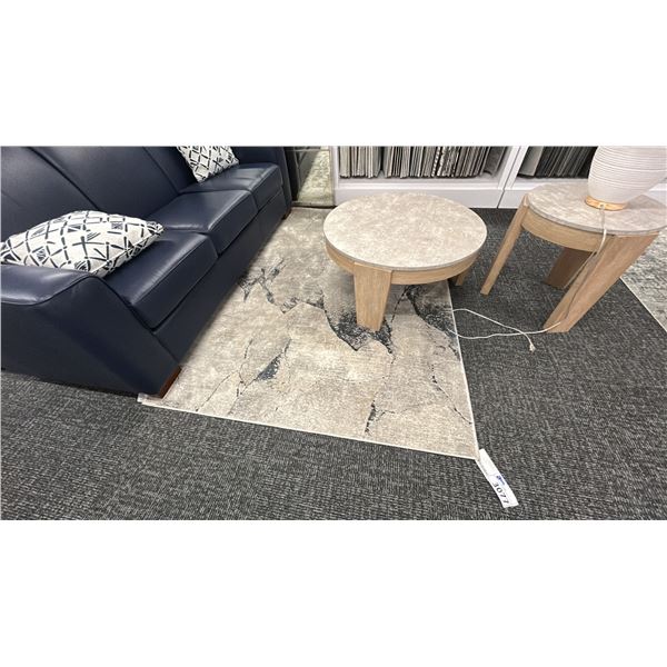 5' X 7'3" SURYA NORLAND 18 POUND RUG.