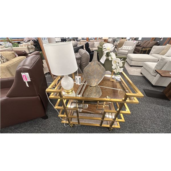 DECORREST SERVING CART. BRUSHED BRASS FRAME. MIRRORED SURFACE. 36" X 22" W/DECOR VASE AND TABLE LAMP