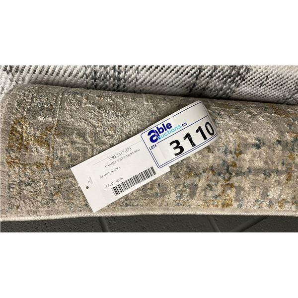 7'3" X 5' SURYA CARAMEL 19 POUND RUG.