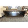 Image 2 : MAGNUSSEN FURNITURE RETANGULAR COCKTAIL TABLE W/CASTERS. 48" X 28". W/GOLD POSY TRAY.