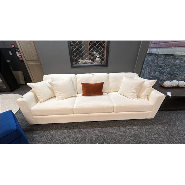 DECORREST WHITE PLUSH SOFA. 8'7" LONG. BLUE OTTOMAN. W/CUSHIONS AS IN PHOTO. RETAIL $3,700