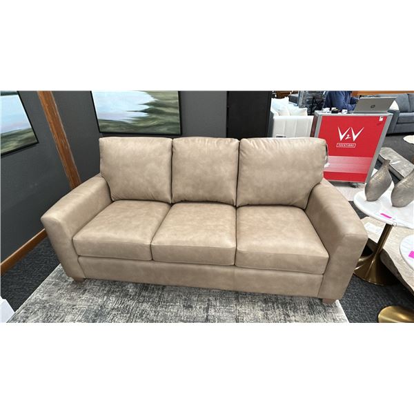 DECORREST LEATHER 82" SOFA. RETAIL $3,799