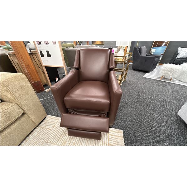 DECORREST LEATHER RECLINING CHAIR. RETAIL $2,200.