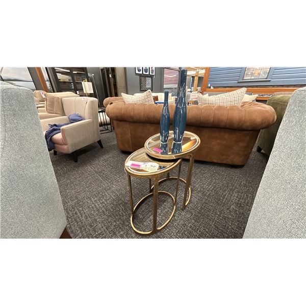 ASHLEY FURNITURE PAIR OF NESTING SIDE TABLES. WEATHERED BRASS FRAME. MIRRORED TOP.