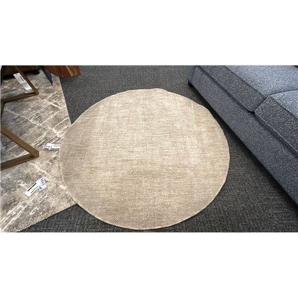 5'3" ROUND SURYA MASTERPIECE AREA CARPET.