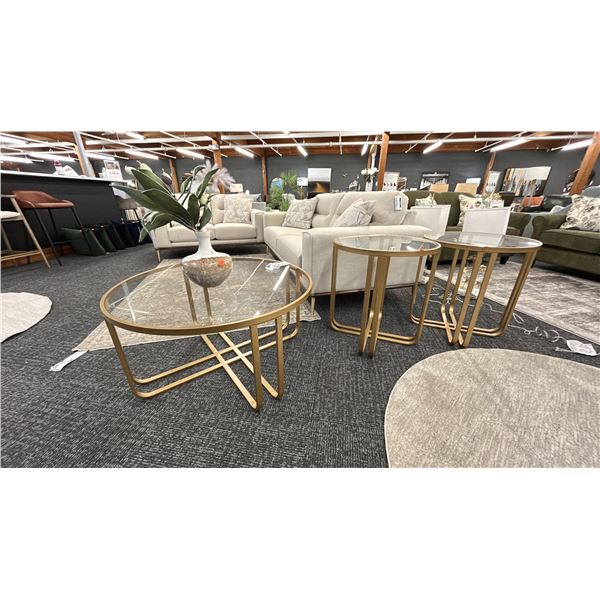 ASHLEY FURNITURE SET OF COFFEE TABLE AND SIDE TABLES. BRASS TOP & BASE W/ VASE AND ARTIFICIAL FLOWER