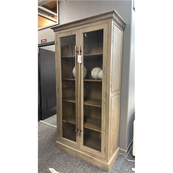 DECORREST CHLOE WASHED OAK GREY CABINET. GLASS DOORS. 40" WIDE X 7' TALL. W/ ROUND SCULPTURES.