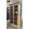 Image 1 : DECORREST CHLOE WASHED OAK GREY CABINET. GLASS DOORS. 40" WIDE X 7' TALL. W/ ROUND SCULPTURES.