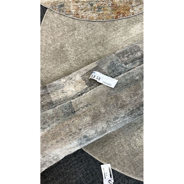 10' X 7'10" SURYA MONTANA 49 POUND CARPET.