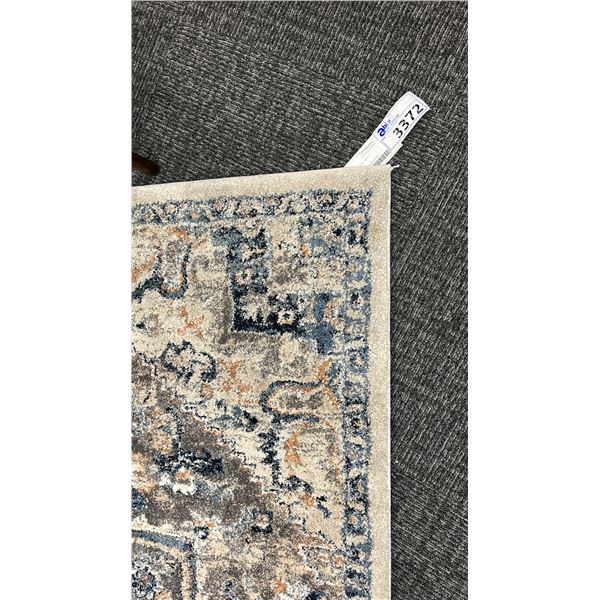 7'3" X 5'3" SURYA TUSCANY BLUE RUG.