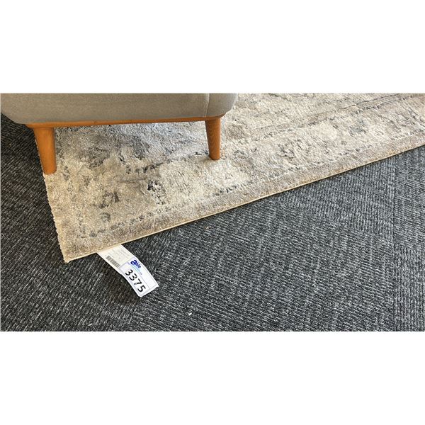 7' X 5'3" SURYA MONTANA RUG.