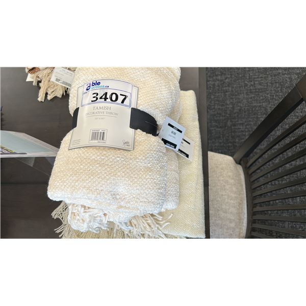 GROUP OF 3 CREAM COLOURED THROW BLANKETS.