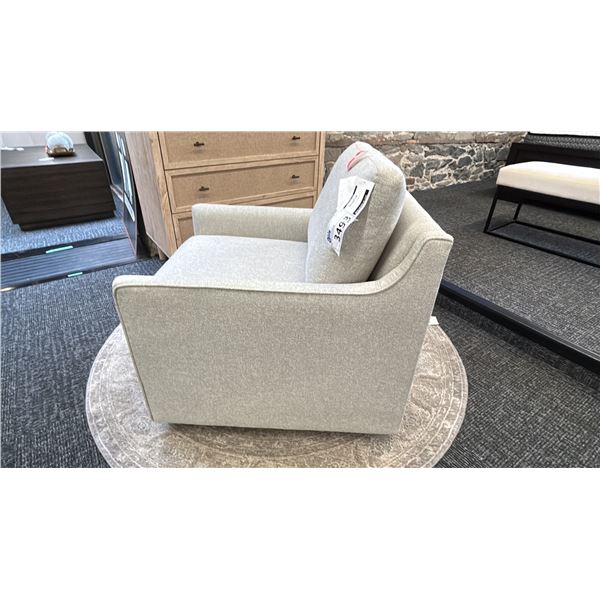 DECORREST SWIVEL UPHOLSTERED CHAIR.