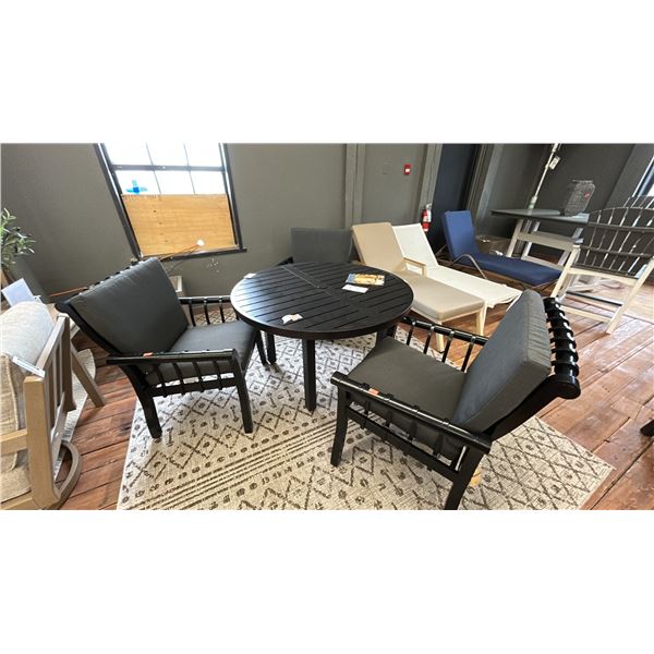 4 PIECE PATIO SET, WOODARD PATIO FURNITURE 48" ROUND TABLE, 3 CUSHIONED ALUMINUM FRAMED CHAIRS.