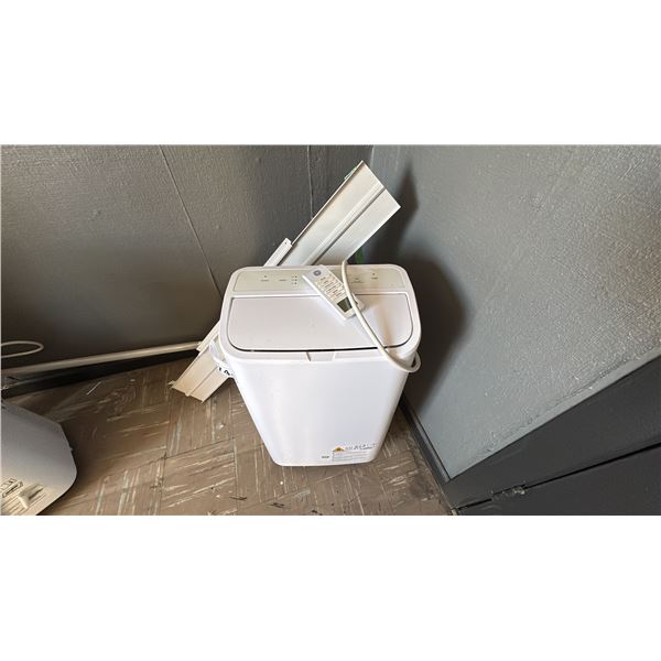 GE PORTABLE AIR CONDITIONER. 10,000 BTU WITH REMOTE