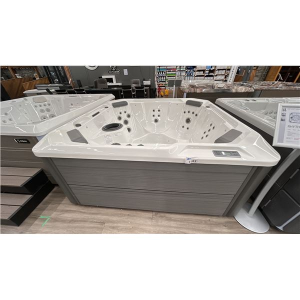 HOTSPRINGS HOT SPOT. RHYTHM, 7 SEAT HOT TUB, 40 JETS, 330 GALLONS, FRESH WATER SALT SYSTEM.