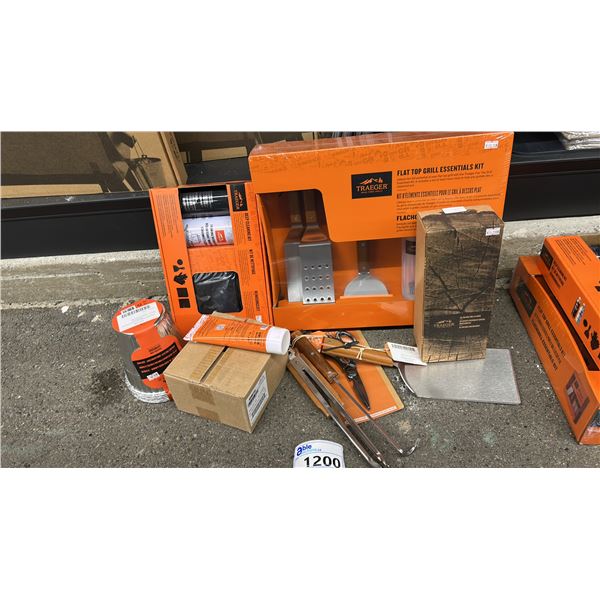 GROUP LOT OF TRAEGER ACCESSORIES.  BOX OF RUBS, LINERS, CLEANING KIT, GRILL ESSENTIALS, CLEANER,