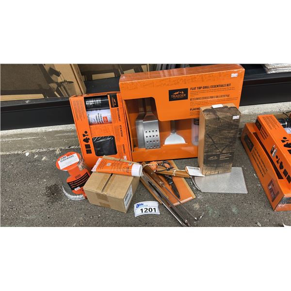 GROUP LOT OF TRAEGER ACCESSORIES.  BOX OF RUBS, LINERS, CLEANING KIT, GRILL ESSENTIALS, CLEANER,