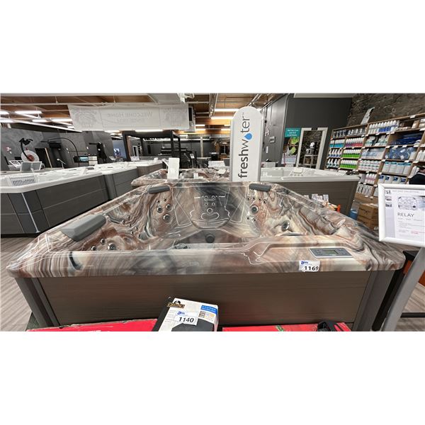HOTSPRING HOT SPOT HOT TUB. RELAY. 6 SEAT. 40 JETS. 340 GALLON. 7'X7'X36"HIGH. $18,000 RETAIL