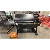 Image 1 : TRAEGER IRONWOOD XL SMOKER GRILL. MODEL TFB93RLGC. $2,900 RETAIL. INCLUDES OPTIONAL COVER.
