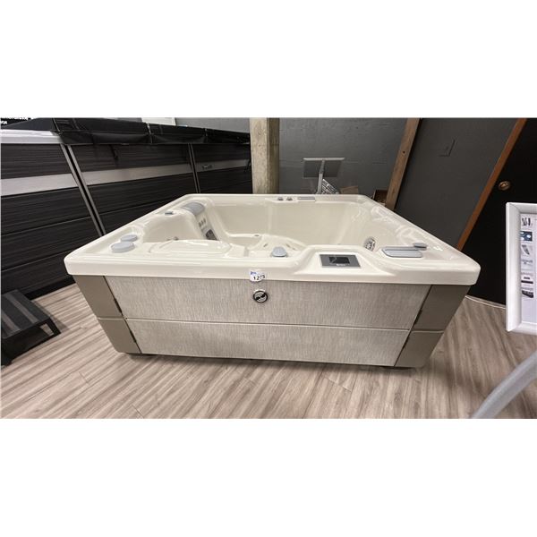 HOTSPRING HIGHLIFE COLLECTION. JETSETTER LX HOT TUB. 3 SEAT. 30 JETS. 250 GALLON. 7'X 5'8" X 33"
