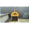 Image 1 : MODERNON PIIZZA OVEN AND STAND. 38"W. PROPANE OR WOOD FIRED. OUTDOOR DEMO UNIT SO REQUIRES