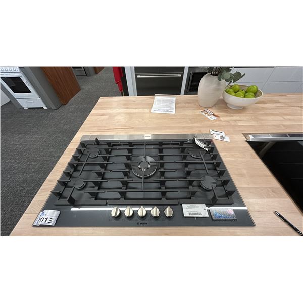 BOSCH 36" 5 BURNER DROP IN COOKTOP. MODEL NGMP677UC. RETAIL $3,050. DOES NOT INCLUDE EXHAUST VENT.