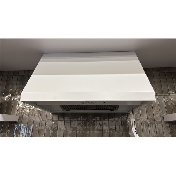 GE CAFE 30" EXHAUST HOOD. BUYER TO REMOVE. MODEL CVW93044PWM RETAIL $2,000