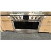 Image 1 : MONOGRAM STATEMENT 48" 4 BURNER DUAL FUEL PROFESSIONAL RANGE. 4 BURNERS, GRILL, GRIDDLE.