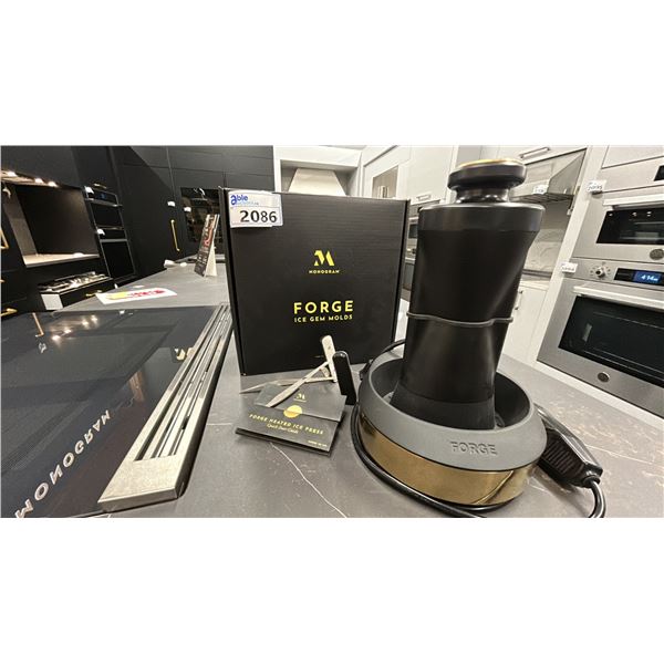 MONOGRAM FORGE ICE GEM MOLD. THE COOL GADGET YOU DIDN'T KNOW YOU NEEDED. HEATED ICE PRESS.