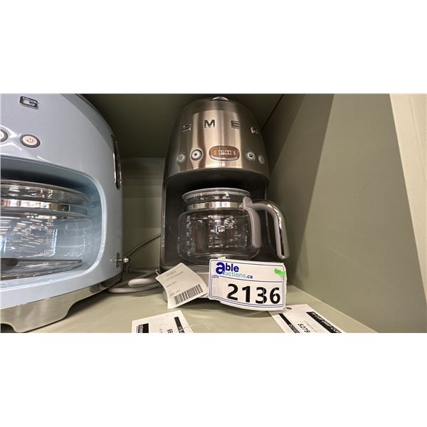 SMEG 10 CUP DRIP COFFEE MAKER. STAINLESS STEEL FINISH. MODEL DCF02SSUS
