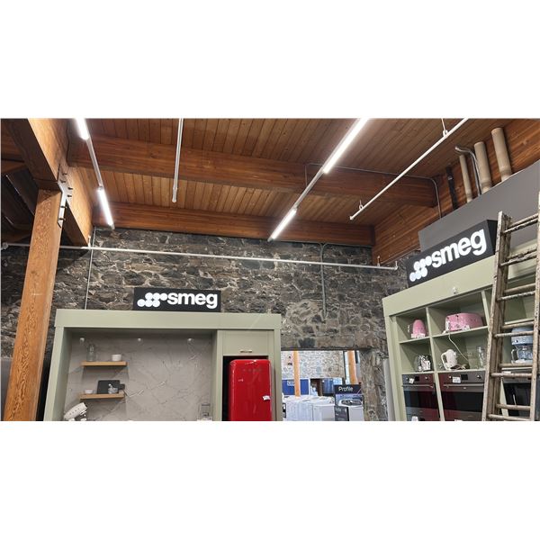 2 SMEG SIGNS, EACH 4' LONG, SMEG RETRACTABLE DISPLAY AND HESTAN SIGN