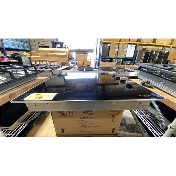 FULGOR MILANO MODEL F3RK24S2. 300 SERIES BLACK 24" 4 ZONE CERAMIC GLASS ELECTRIC COOKTOP