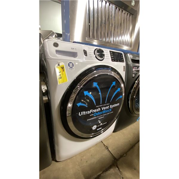 G.E APPLIANCES MODEL GFW550SMNWW. 5.5 CU FT HIGH EFFICIENCY FRONT LOAD SMART WASHING MACHINE