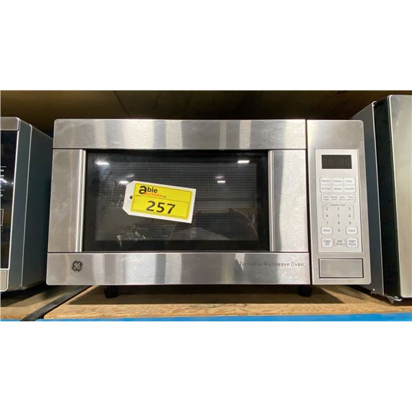 G.E APPLIANCES MODEL JE1140STC. STAINLESS STEEL 1.1 CU FT BUILT IN MICROWAVE OVEN