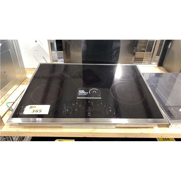 GE MONOGRAM MODEL ZEU30RSJ2SS. 30" STAINLESS STEEL ELECTRIC COOKTOP