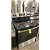 Image 1 : GE MODEL JCBS630SV1SS. BLACK & STAINLESS 4 BURNER GLASS TOP ELECTRIC STOVE