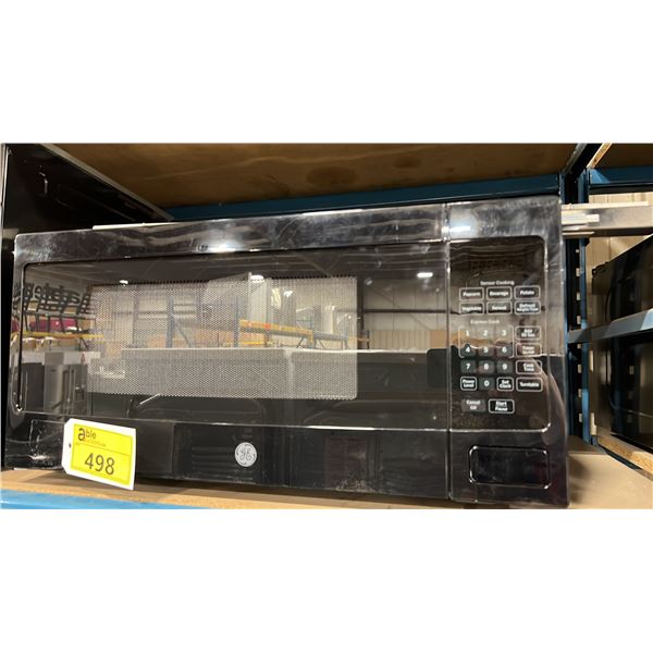 G.E APPLIANCES MODEL PREM10BFC. COMPACT 1.1 CU. FT. COUNTERTOP MICROWAVE OVEN