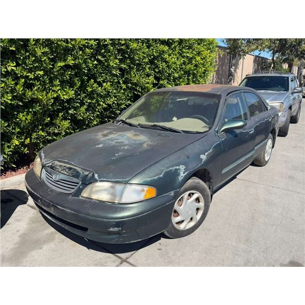 MAZD 626DX 1998 T-TMU