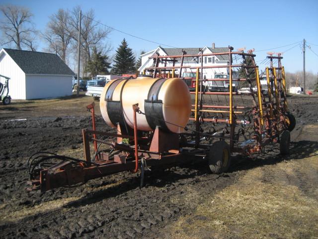 Multiweeder Spring Multi-weeder, Melroe 32 ft 2 rank multiweeder with tank and pump.