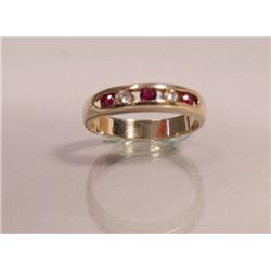 A Ladies 14 kt Yellow Gold, Diamond and Ruby Ring,