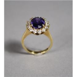 A Ladies 18 kt Yellow Gold, Tanzanite and Diamond Ring,