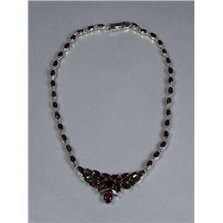 A Sterling Silver and Garnet Necklace,
