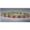 Image 1 : A Sterling Silver and Gold Vermeil Diamond and Ruby Bracelet.